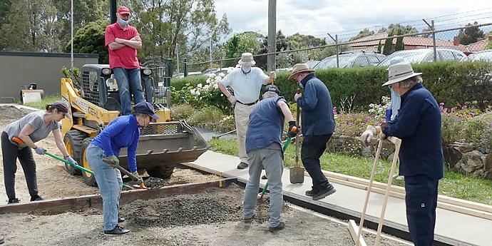 As usual the women worked hard while the men rested on their laurels (shovels?)