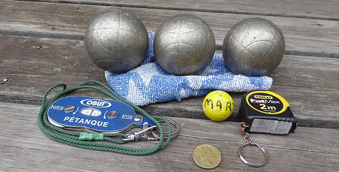 You don't need much gear to play:  boules, cosh, tape, counter, rag, $1